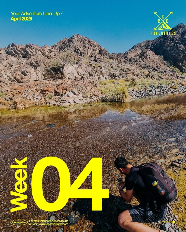 Person with backpack crouches by rocky stream; mountains and promotional text visible.